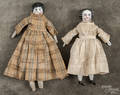 Three bisque molded head and shoulder dolls