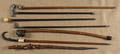 Seven assorted walking sticks