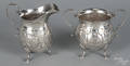 Sterling silver creamer and sugar bowl with chased floral decoration