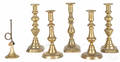 Two pairs of English brass candlesticks