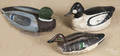 Three carved and painted duck decoys
