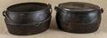 Two cast iron kettles