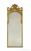 Exceptional George II carved giltwood looking glass ca 1750