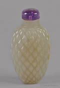 Chinese carved celadon jade rice pattern snuff bottle