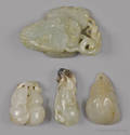 Four Chinese carved jade gourd pendants