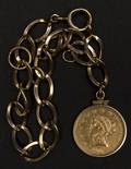 Gold bracelet with a gold Liberty Head two and a half dollar coin