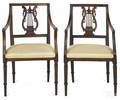 Pair of French Directoire fruitwood armchairs early 19th c