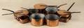 Large group of copper cookware