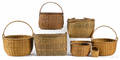 Seven assorted woven baskets