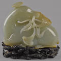 Chinese carved celadon and russet jade horse