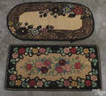 Two floral hooked rugs