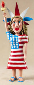 Carved and painted outsider art figure of Lady Liberty
