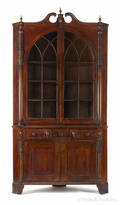 Pennsylvania stained poplar twopart corner cupboard
