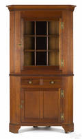 Pennsylvania cherry twopart corner cupboard ca 1825
