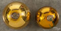 Two gold round kugels
