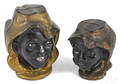 Two cast iron double black face still banks