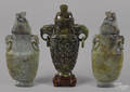 Chinese carved spinach and russet jade urn and cover