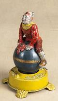 Cast iron Clown on Globe mechanical bank