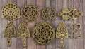 Nine brass trivets