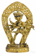 Tibetan gilt bronze figure of Yamantaka holding Vajravetali