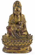 Chinese carved and gilded bronze and stone Buddha with a child 19th c