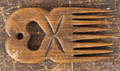 Carved pine comb