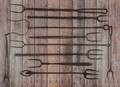 Ten wrought iron flesh forks