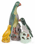 Three Chinese Qing dynasty porcelain parrots