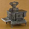 Dent cast iron and nickel  The Queen  toy stove