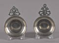 Two New England pewter porringers early 19th c
