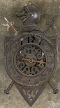 Cast iron shield wall clock with a knight and a pike crest