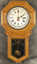 New Haven Eclipse regulator clock with an oak case