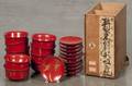 Set of ten Japanese lacquerware covered rice bowls with gold floral and bird decoration