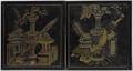 Two Japanese handpainted black and gilt decorated wall plaques