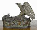 J  E Stevens cast iron Eagle and Eaglets mechanical bank