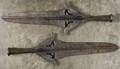Two cast iron pike points