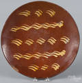 Pennsylvania slip decorated redware charger