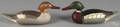 Pair of Wildfowler carved and painted red breasted merganser duck decoys