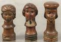Three Continental carved and painted figural game pieces