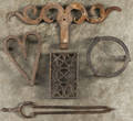 Three iron trivets