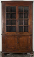 Pennsylvania walnut onepiece corner cupboard