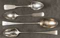 Two English sterling silver serving spoons