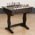 Jacobean style oak chess table with a pewter American Revolution chess set
