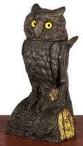 J  E Stevens cast iron owl turns head mechanical bank