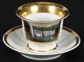 American gilt and painted porcelain tea cup and saucer