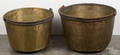 Two large brass and wrought iron apple butter cauldrons