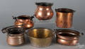 Six pieces of assorted copper cookware with iron handles