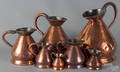 Assembled set of seven English copper haystack measures