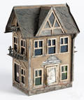 Painted tin model house