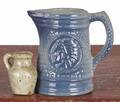 Miniature blue and white pitcher